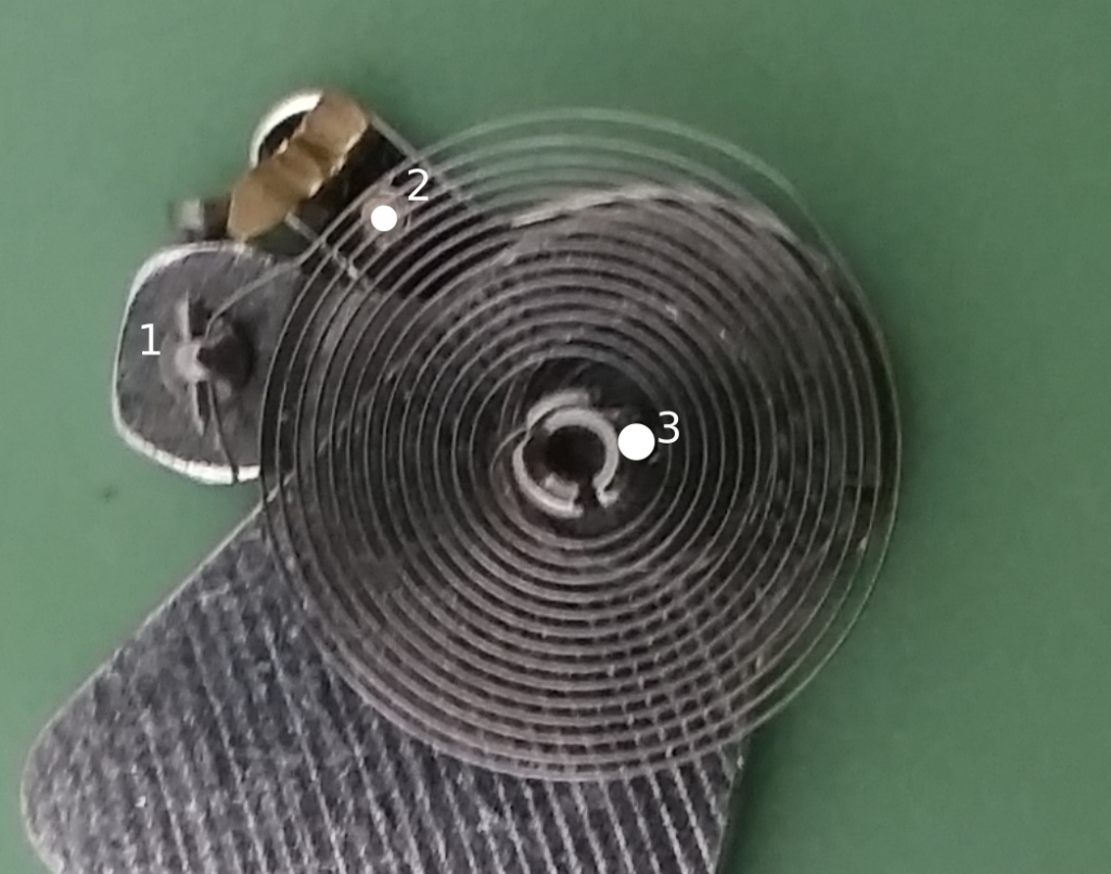 hairspring in balance cock